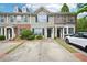 Charming townhome features well-maintained landscaping and private driveways at 2084 Del Lago Nw Cir # 1, Kennesaw, GA 30152