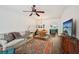 Open-concept living room with hardwood floors and plenty of natural light at 2084 Del Lago Nw Cir # 1, Kennesaw, GA 30152
