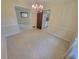 Bright dining room with a chandelier and tile floors at 2206 Rhett Ct, Lawrenceville, GA 30044