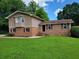 Charming brick home with a well-maintained lawn and inviting curb appeal at 2206 Rhett Ct, Lawrenceville, GA 30044