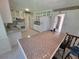 Bright, spacious kitchen with tile floors and a large center island at 2206 Rhett Ct, Lawrenceville, GA 30044