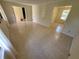 Spacious living room with neutral tile floors leading to other rooms at 2206 Rhett Ct, Lawrenceville, GA 30044