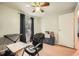 Bedroom with wood look floors, ceiling fan and window at 5273 Martins Crossing Rd, Stone Mountain, GA 30088