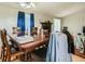 Dining room with wooden table and chairs, hardwood flooring at 5273 Martins Crossing Rd, Stone Mountain, GA 30088