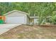 Charming single-story home with attached garage and driveway at 5273 Martins Crossing Rd, Stone Mountain, GA 30088