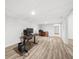 Finished basement area with an office and wood-look flooring at 1035 Hunterhill Dr, Roswell, GA 30075