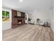 Finished basement features fireplace, hardwood floors and neutral paint to make this room comfortable at 1035 Hunterhill Dr, Roswell, GA 30075