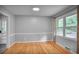 Cozy dining room with hardwood floors, natural light, and elegant trim work along the walls at 2473 Melinda Ne Dr, Atlanta, GA 30345