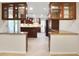 Spacious kitchen with dark wood cabinets, granite countertops, and modern stainless steel appliances at 2473 Melinda Ne Dr, Atlanta, GA 30345