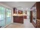 Updated kitchen featuring sleek stainless steel appliances and dark wood cabinets with stylish lighting fixtures at 2473 Melinda Ne Dr, Atlanta, GA 30345