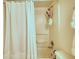 Clean bathroom with shower-tub, white shower curtain, and chrome fixtures at 795 Hammond Dr # 506, Sandy Springs, GA 30328