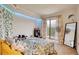 Cozy bedroom with a sliding glass door to the balcony and comfortable interior design and decor at 795 Hammond Dr # 506, Sandy Springs, GA 30328