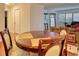 View of dining room with hardwood floors and neutral paint color and easy access to the kitchen at 795 Hammond Dr # 506, Sandy Springs, GA 30328