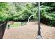 Dog park with a bench, dog-friendly play structures and green turf at 795 Hammond Dr # 506, Sandy Springs, GA 30328