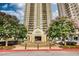 Exterior shot of the building entrance with a water fountain and landscaping at 795 Hammond Dr # 506, Sandy Springs, GA 30328