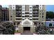 Striking exterior of Park Towers featuring lush landscaping and inviting entrance at 795 Hammond Dr # 506, Sandy Springs, GA 30328