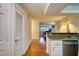 Bright kitchen with stainless steel appliances and granite countertops overlooks the living area at 795 Hammond Dr # 506, Sandy Springs, GA 30328
