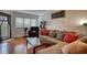 Comfortable living room featuring hardwood floors, a large window, and cozy furnishings at 795 Hammond Dr # 506, Sandy Springs, GA 30328
