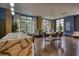 Bright living room with hardwood floors, stylish furniture, and large windows offering lots of natural light at 795 Hammond Dr # 506, Sandy Springs, GA 30328