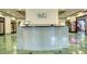 Modern reception desk with sleek design, offering a welcoming point of contact for residents and guests at 795 Hammond Dr # 506, Sandy Springs, GA 30328