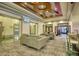 Lobby area featuring comfortable seating, high ceilings, and access to the elevators at 795 Hammond Dr # 506, Sandy Springs, GA 30328