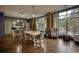 Spacious lounge featuring a large dining table, kitchen, and comfortable seating areas at 795 Hammond Dr # 506, Sandy Springs, GA 30328