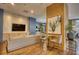 Comfortable lounge area with stylish decor, large TV, and inviting seating, perfect for relaxation and socializing at 795 Hammond Dr # 506, Sandy Springs, GA 30328