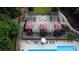Aerial view of the pool deck, lounge chairs, and poolside cabanas with relaxing views at 795 Hammond Dr # 506, Sandy Springs, GA 30328