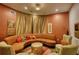 Comfortable sitting area with plush seating, decorative pillows, and elegant curtains at 795 Hammond Dr # 506, Sandy Springs, GA 30328