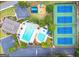 An aerial view highlights the community amenities: pool, tennis courts, playground, and parking at 2167 Merrymount Dr, Suwanee, GA 30024
