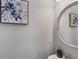 Powder room featuring updated mirror and paint at 2167 Merrymount Dr, Suwanee, GA 30024
