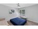 A bedroom with a bench, daybed and lots of natural light at 2167 Merrymount Dr, Suwanee, GA 30024