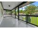 Covered front porch offers great views of the neighborhood and has painted black and white accents at 2266 Kennedy Nw Ct, Atlanta, GA 30318