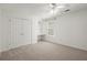 Spacious bedroom features a ceiling fan, closet, and a window for natural light at 4085 Tritt Homestead Dr, Marietta, GA 30062