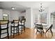 Open concept kitchen features an island, eat-in area, and lots of natural light at 4085 Tritt Homestead Dr, Marietta, GA 30062