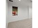 Room with carpet, a window view of a wood deck, and a white paint scheme at 4085 Tritt Homestead Dr, Marietta, GA 30062