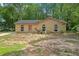 Charming single-story brick home featuring arched windows and a new roof at 6010 Fieldcrest Dr, Morrow, GA 30260