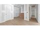 Bright hallway with wood flooring leading to other rooms at 6010 Fieldcrest Dr, Morrow, GA 30260