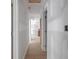 Hallway with recently installed floors and freshly prepared walls, ready to be updated at 6010 Fieldcrest Dr, Morrow, GA 30260