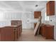 Kitchen with wood cabinets and flooring being remodeled at 6010 Fieldcrest Dr, Morrow, GA 30260