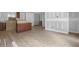 Open-concept living room with wood flooring, ready for your personal touch at 6010 Fieldcrest Dr, Morrow, GA 30260