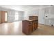 Open-concept kitchen and living room with space for entertaining and island seating at 6010 Fieldcrest Dr, Morrow, GA 30260