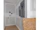 Functional utility room area with hookups and electrical panel at 6010 Fieldcrest Dr, Morrow, GA 30260