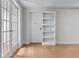 Basement doors with built-in shelving and neutral walls, leading to additional living space at 6020 Cochran Mill Rd, Palmetto, GA 30268