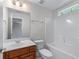 Bathroom featuring a vanity with a sink, toilet, and tub-shower combo at 6020 Cochran Mill Rd, Palmetto, GA 30268