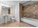 Updated bathroom featuring a single vanity, toilet, and tiled shower-tub combo with a modern design at 6020 Cochran Mill Rd, Palmetto, GA 30268