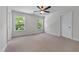 Bright bedroom with neutral colors and natural light from two windows at 6020 Cochran Mill Rd, Palmetto, GA 30268