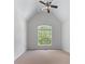 A bedroom with neutral carpet, and a window with natural light streaming in at 6020 Cochran Mill Rd, Palmetto, GA 30268