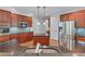 Well-equipped kitchen featuring stainless steel appliances and dark wood cabinets at 6020 Cochran Mill Rd, Palmetto, GA 30268