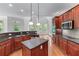 Spacious kitchen with granite countertops, stainless steel appliances, and a center island at 6020 Cochran Mill Rd, Palmetto, GA 30268